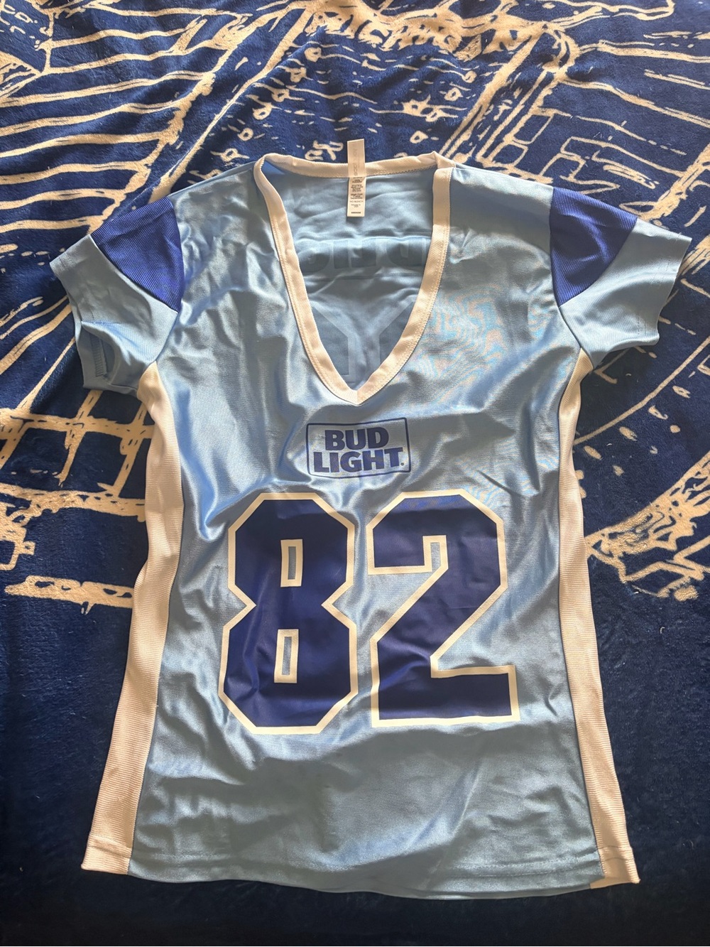Women's Light Blue Jersey Top with Number 82